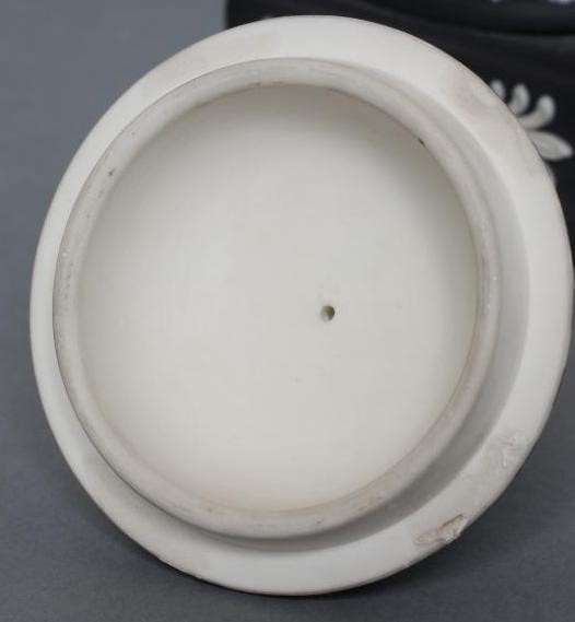 A WEDGWOOD BLACK JASPER DIP "DANCING HOURS" VASE AND COVER Image