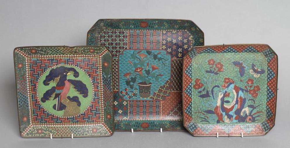 TWO CHINESE CLOISONNE ENAMEL SQUARE TRAYS with canted angles inlaid in sombre colours Image