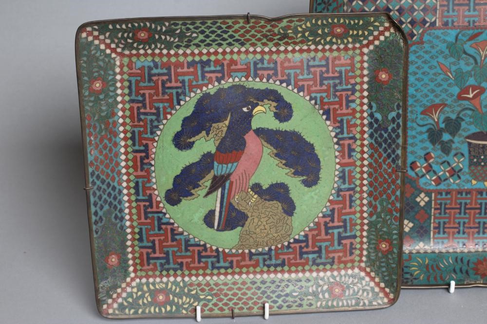 TWO CHINESE CLOISONNE ENAMEL SQUARE TRAYS with canted angles inlaid in sombre colours Image