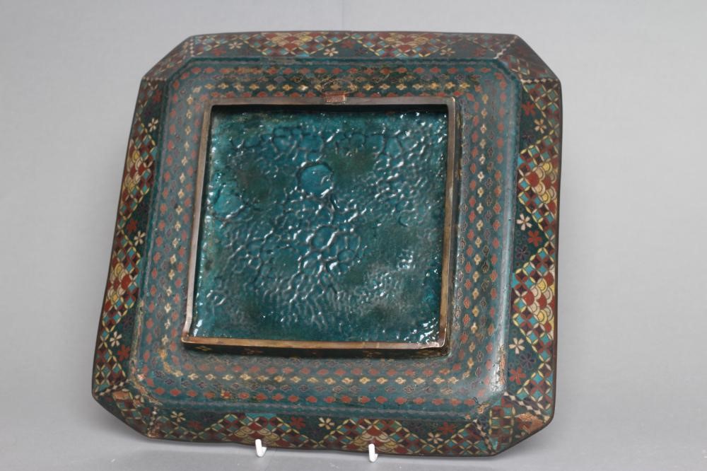 TWO CHINESE CLOISONNE ENAMEL SQUARE TRAYS with canted angles inlaid in sombre colours Image
