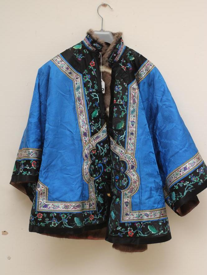 A CHINESE FUR LINED SILK JACKET Image