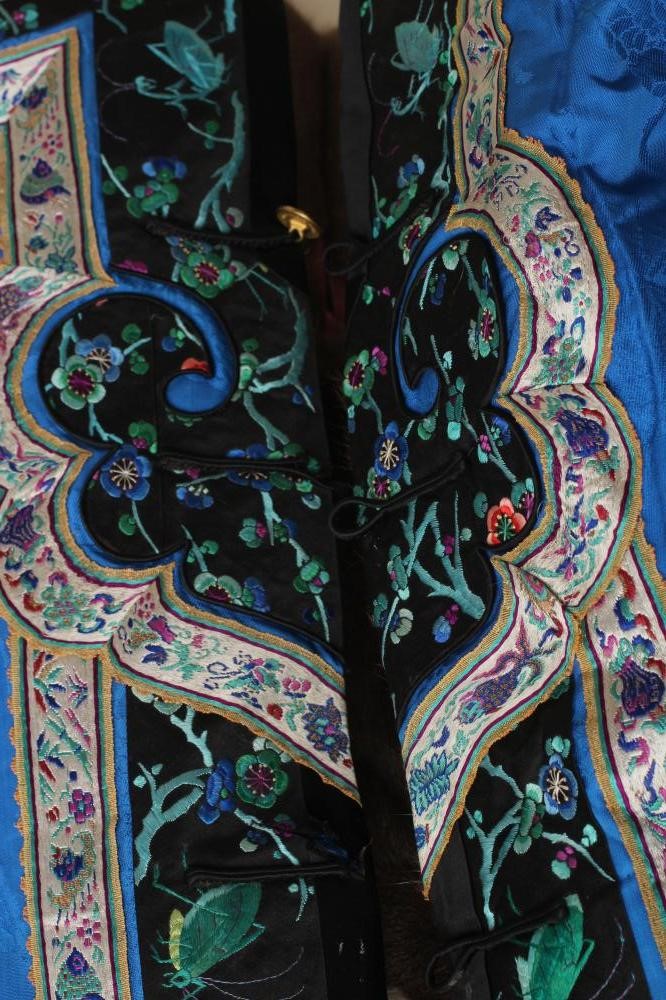 A CHINESE FUR LINED SILK JACKET Image