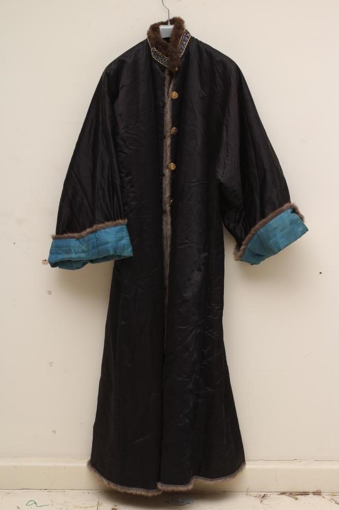 A CHINESE FUR LINED SILK JACKET Image