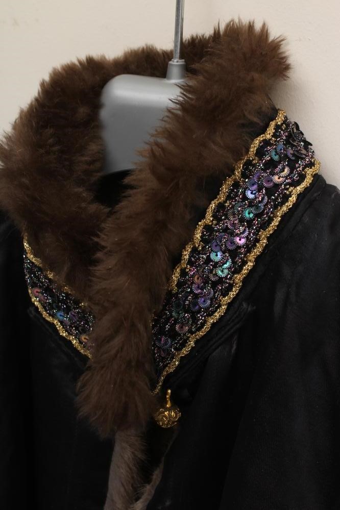 A CHINESE FUR LINED SILK JACKET Image