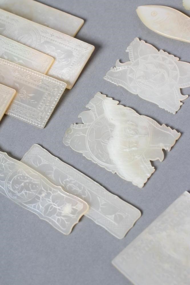 A COLLECTION OF FIFTY TWO CHINESE MOTHER OF PEARL GAMING COUNTERS Image