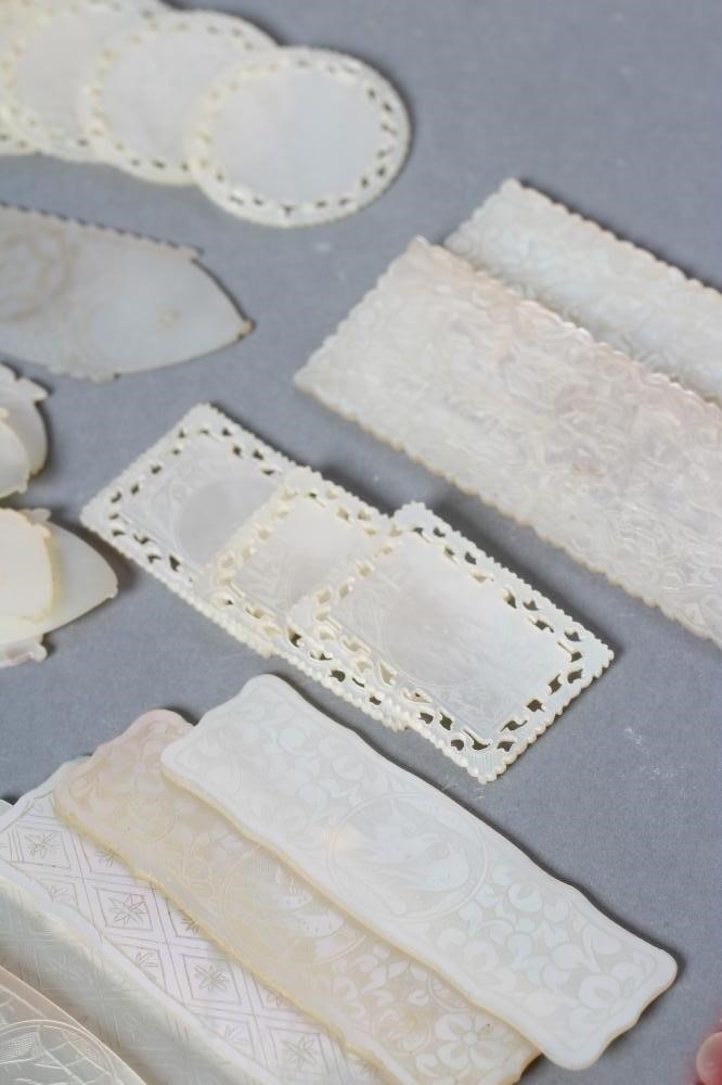 A COLLECTION OF FIFTY TWO CHINESE MOTHER OF PEARL GAMING COUNTERS Image