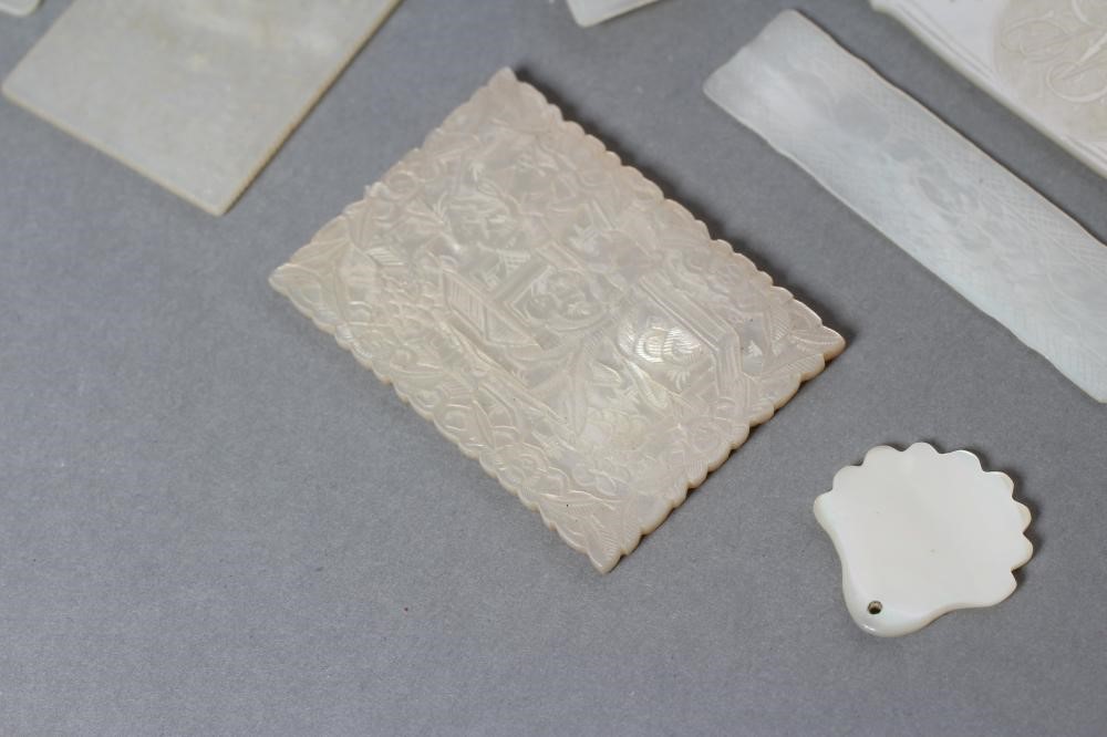 A COLLECTION OF FIFTY TWO CHINESE MOTHER OF PEARL GAMING COUNTERS Image