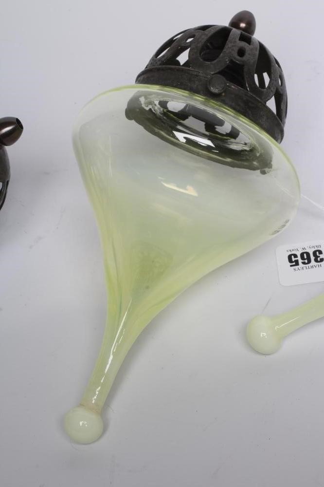 A SET OF THREE VASELINE GLASS LIGHT PENDANTS Image