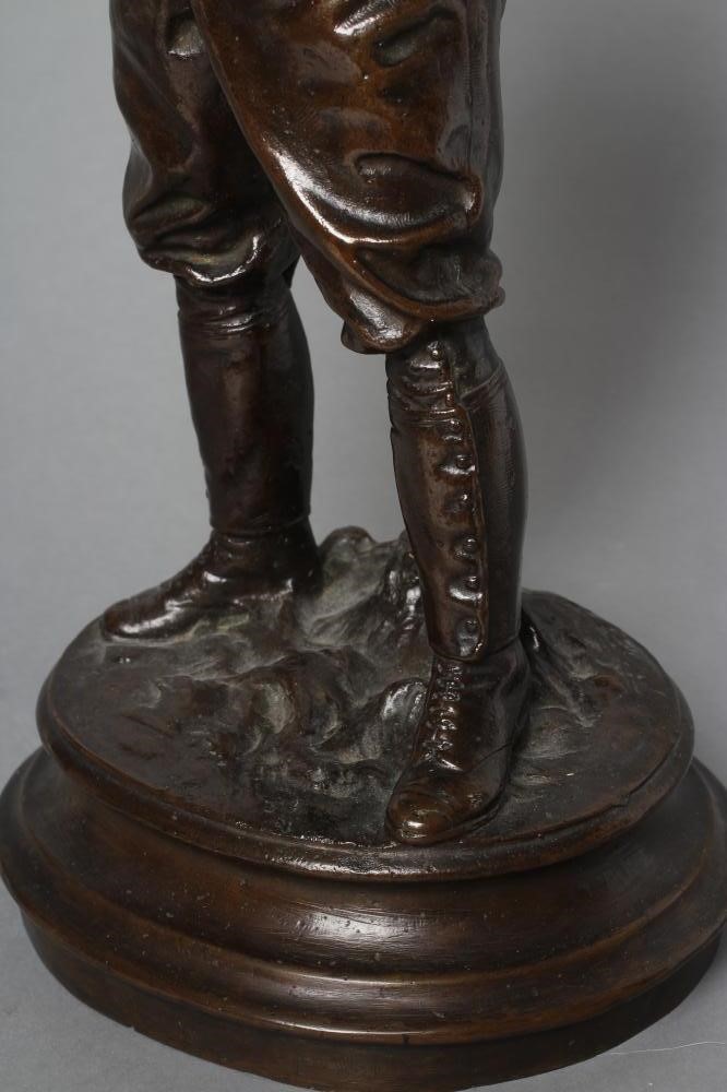 A BRONZE FIGURE OF EDWARD VII modelled standing in riding boots and hat Image