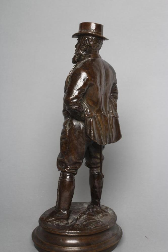 A BRONZE FIGURE OF EDWARD VII modelled standing in riding boots and hat Image