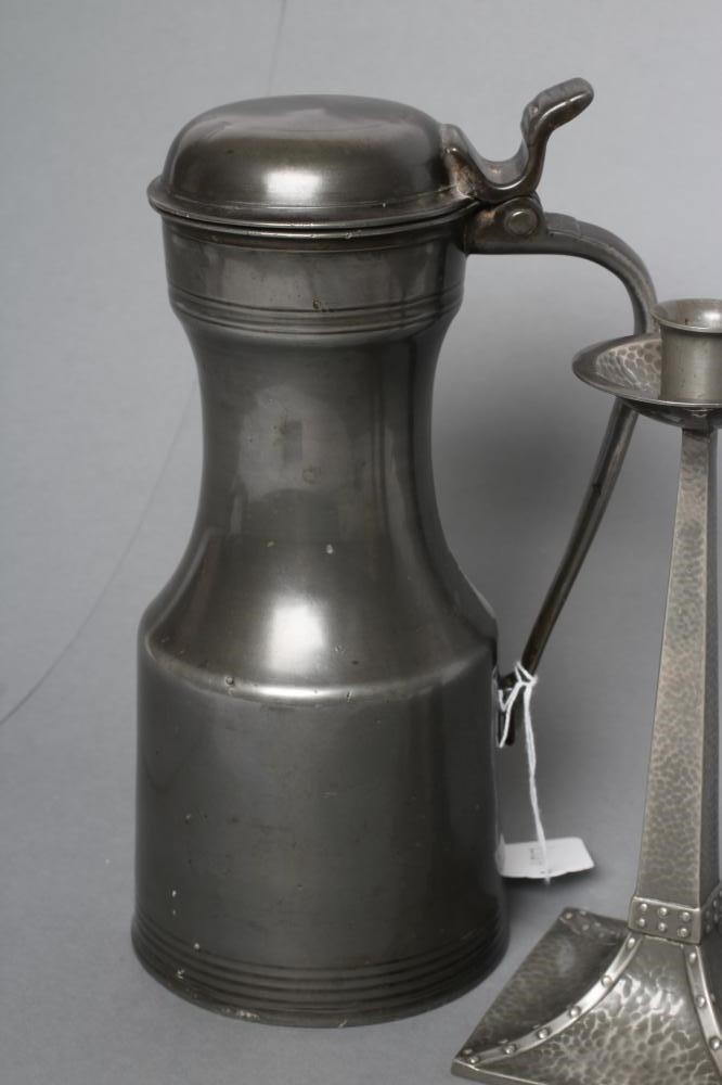 A PAIR OF "CORNISH" PEWTER ARTS AND CRAFTS STYLE CANDLESTICKS by James Dixon Image