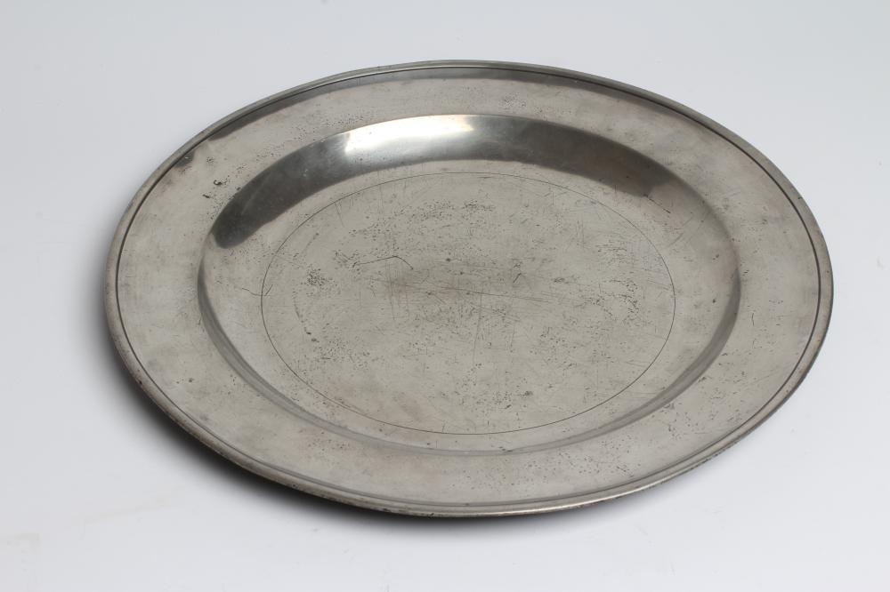 A SINGLE REED PEWTER CHARGER Image