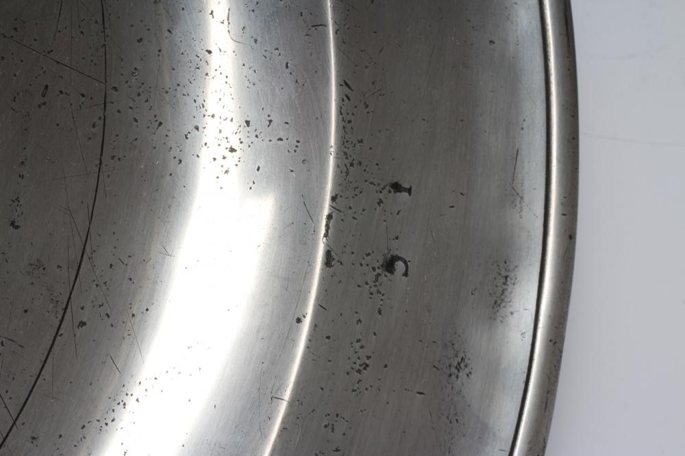 A SINGLE REED PEWTER CHARGER Image