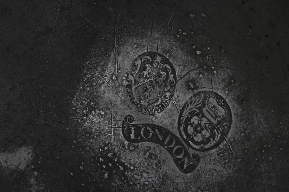 A SINGLE REED PEWTER CHARGER Image