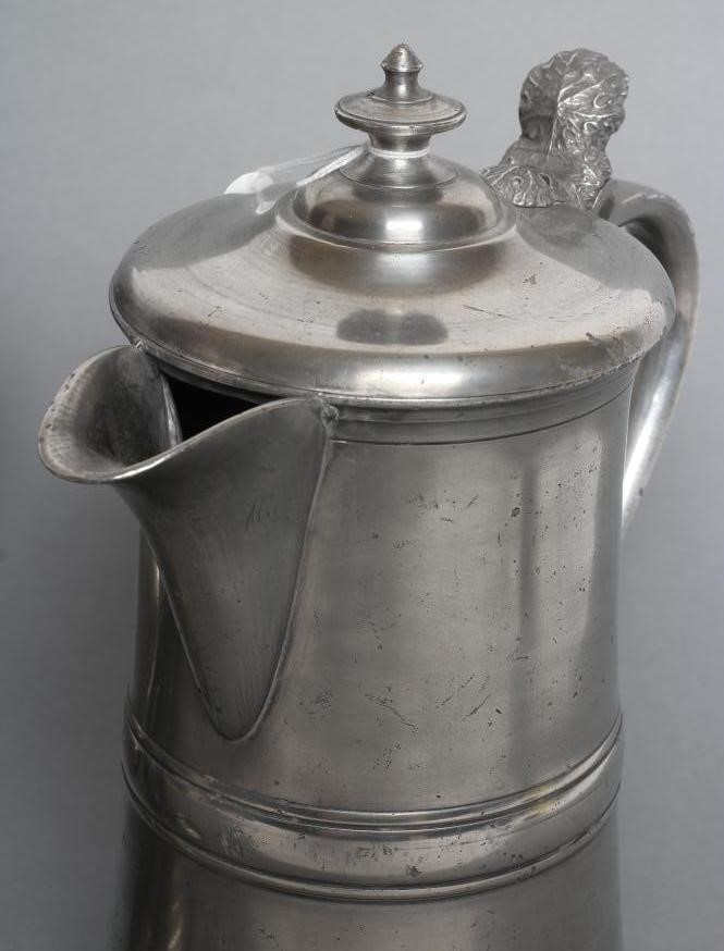 A BRITANNIA METAL HALF GALLON FLAGON Image