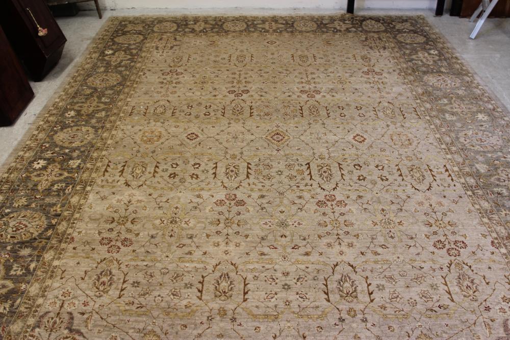 A persian style wool carpet Hartleys Auctioneers & Valuers