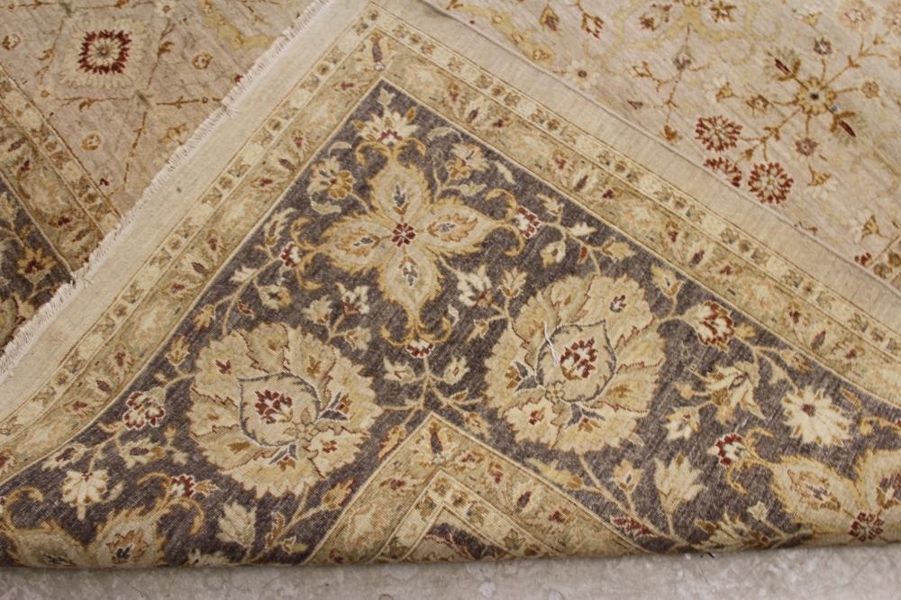 A persian style wool carpet Hartleys Auctioneers & Valuers