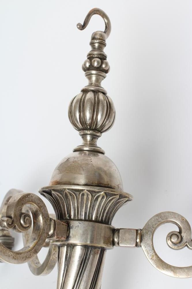 A PAIR OF EDWARDIAN SILVER PLATED LIGHT PENDANTS Image