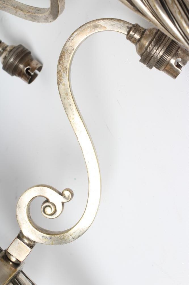 A PAIR OF EDWARDIAN SILVER PLATED LIGHT PENDANTS Image