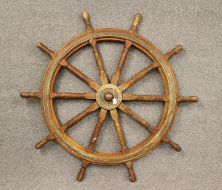 A SHIP'S EMERGENCY STEERING WHEEL by Brown Brothers Image
