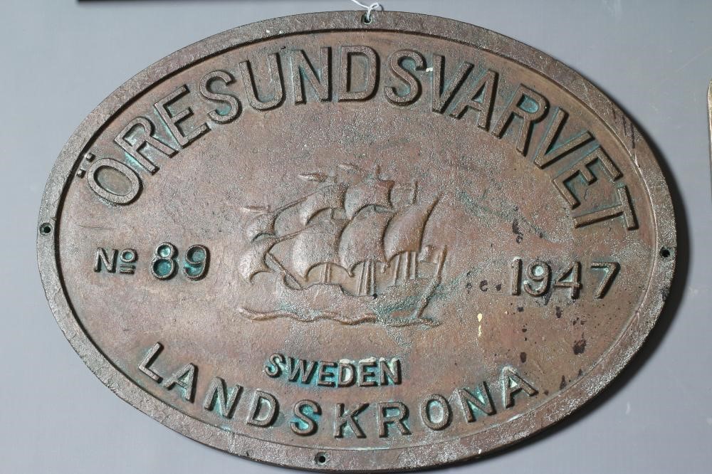 A COLLECTION OF BRONZE SHIP BUILDERS' NAME PLATES including a pair from the Lubecker Flander-Werke Image