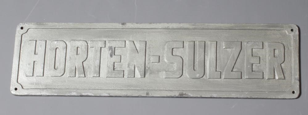 A COLLECTION OF BRONZE SHIP BUILDERS' NAME PLATES including a pair from the Lubecker Flander-Werke Image