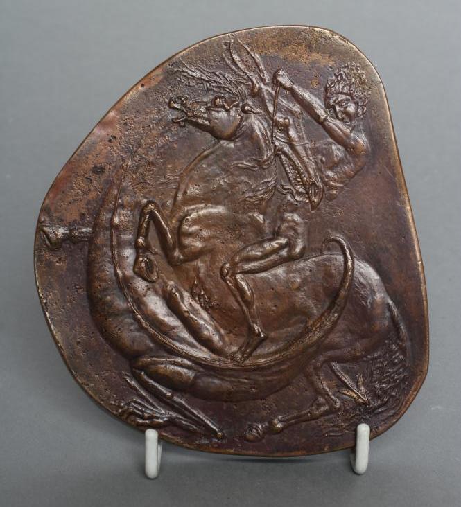 A SMALL BRONZE PLAQUE Image