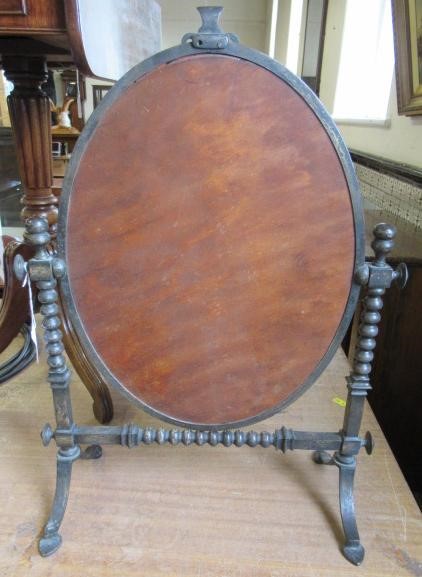 AN ARTS AND CRAFTS SILVERED STEEL FRAMED TOILET MIRROR Image