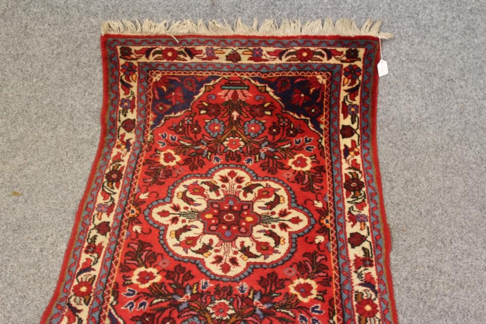 A PERSIAN TRIBAL WOOL RUNNER Image