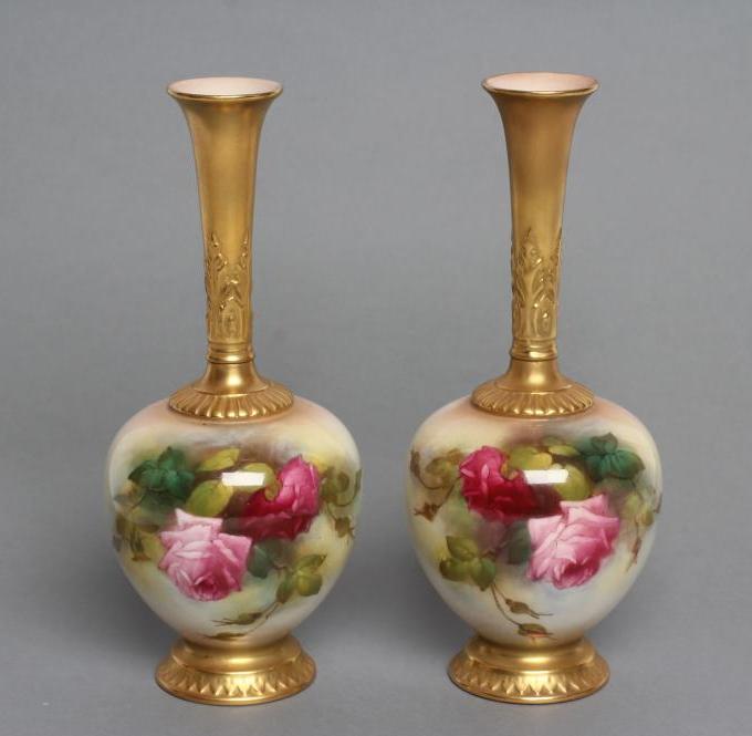 A PAIR OF ROYAL WORCESTER CHINA BUD VASES Image
