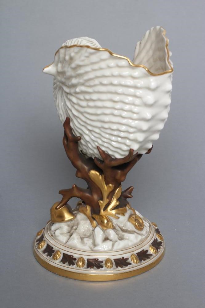 A LATE VICTORIAN ROYAL WORCESTER CHINA NAUTILUS SHELL VASE raised upon bronzed and gilded coral and Image