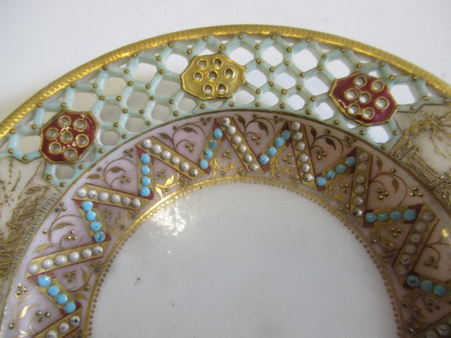 A LATE VICTORIAN ROYAL WORCESTER CHINA RETICULATED CABINET CUP AND SAUCER Image