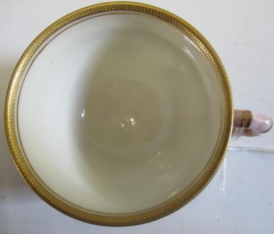 A LATE VICTORIAN ROYAL WORCESTER CHINA RETICULATED CABINET CUP AND SAUCER Image