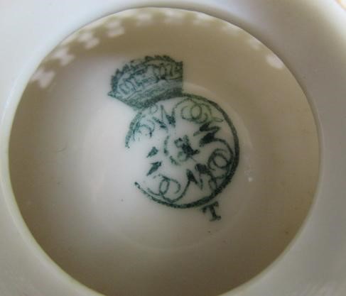 A LATE VICTORIAN ROYAL WORCESTER CHINA RETICULATED CABINET CUP AND SAUCER Image