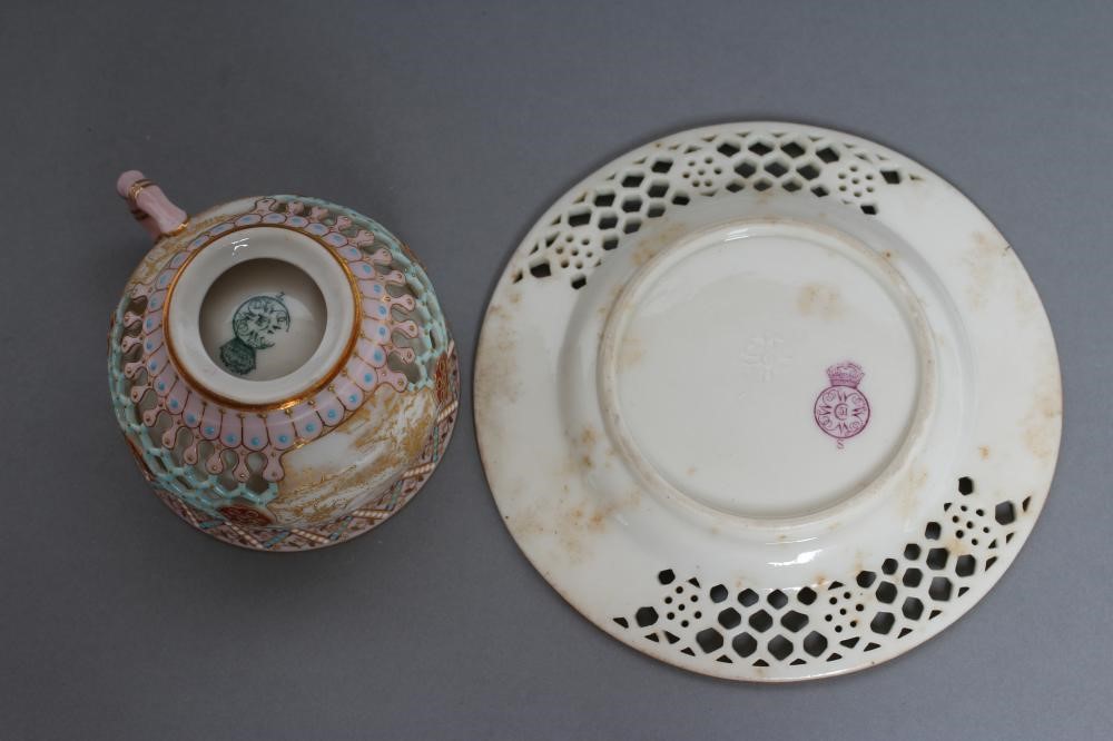 A LATE VICTORIAN ROYAL WORCESTER CHINA RETICULATED CABINET CUP AND SAUCER Image