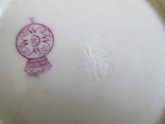 A LATE VICTORIAN ROYAL WORCESTER CHINA RETICULATED CABINET CUP AND SAUCER Image