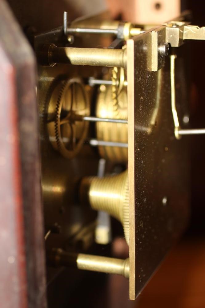 AN OAK WALL TIME PIECE Image