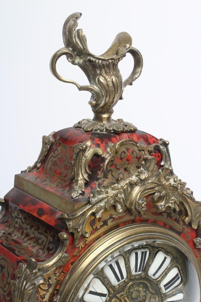 A FRENCH RED BOULLE AND GILT METAL TABLE CLOCK Image