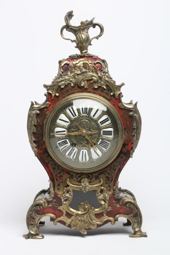 A FRENCH RED BOULLE AND GILT METAL TABLE CLOCK Image