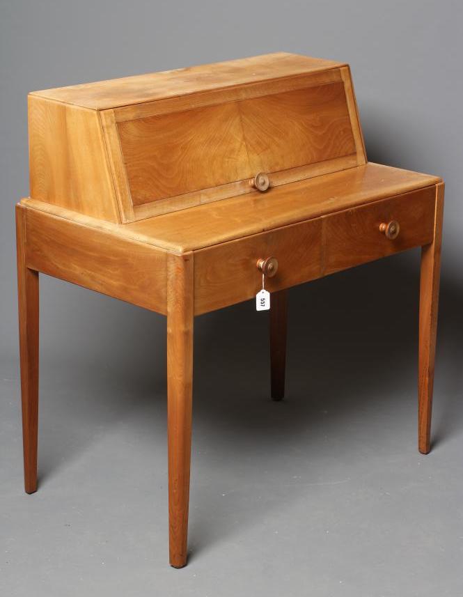 A GORDON RUSSELL WALNUT WRITING TABLE Image