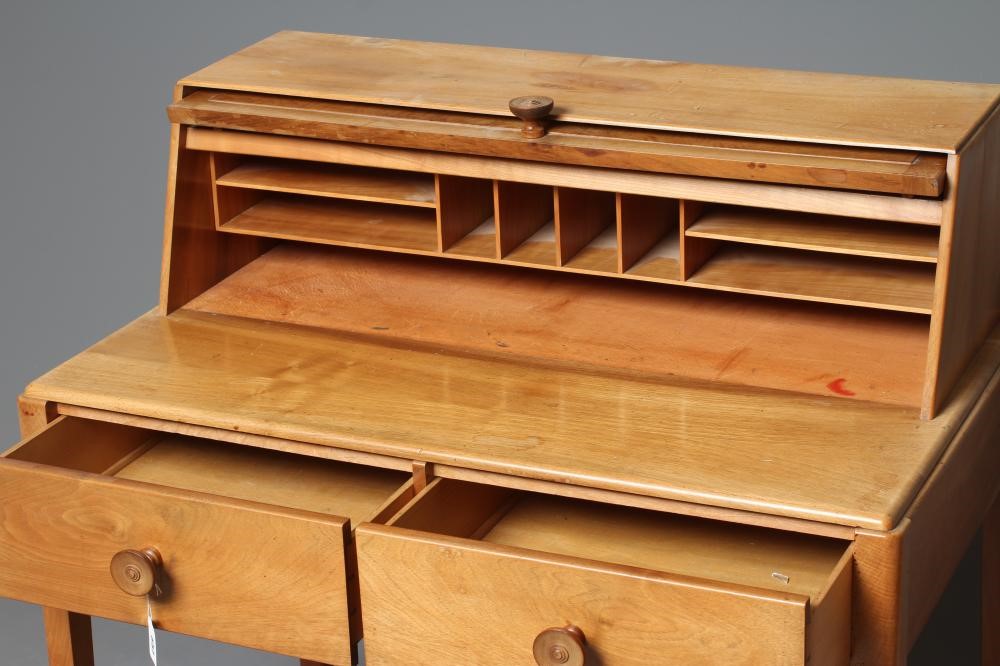 A GORDON RUSSELL WALNUT WRITING TABLE Image