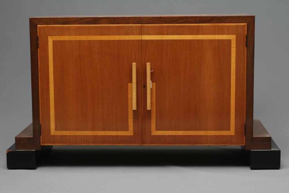 AN ART DECO TWO TONE MAHOGANY SIDEBOARD of oblong form with satinwood banding and ebonised trim Image