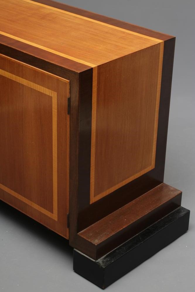 AN ART DECO TWO TONE MAHOGANY SIDEBOARD of oblong form with satinwood banding and ebonised trim Image