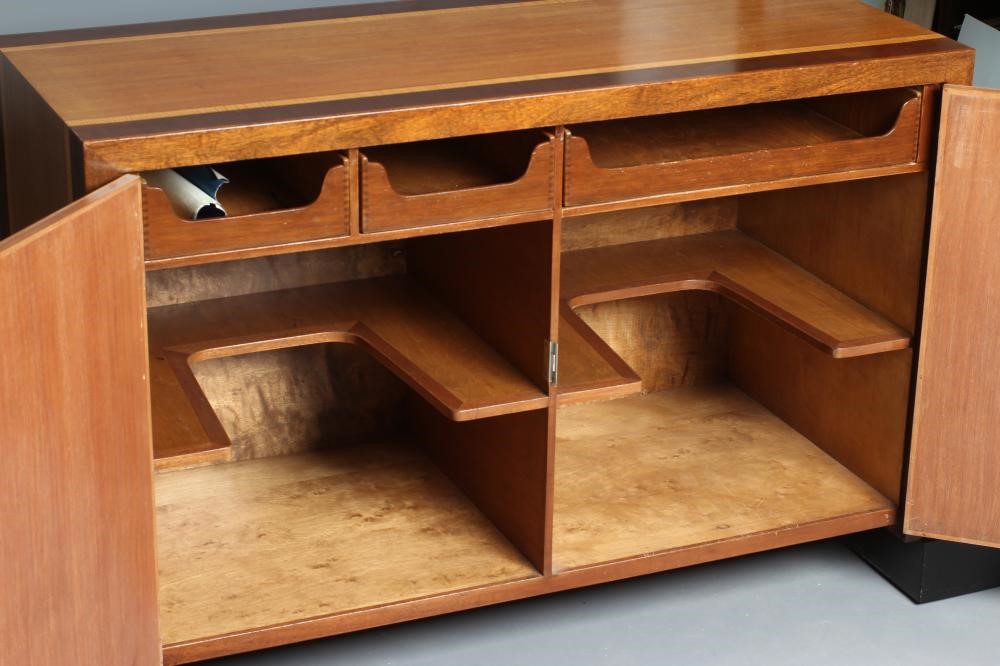 AN ART DECO TWO TONE MAHOGANY SIDEBOARD of oblong form with satinwood banding and ebonised trim Image