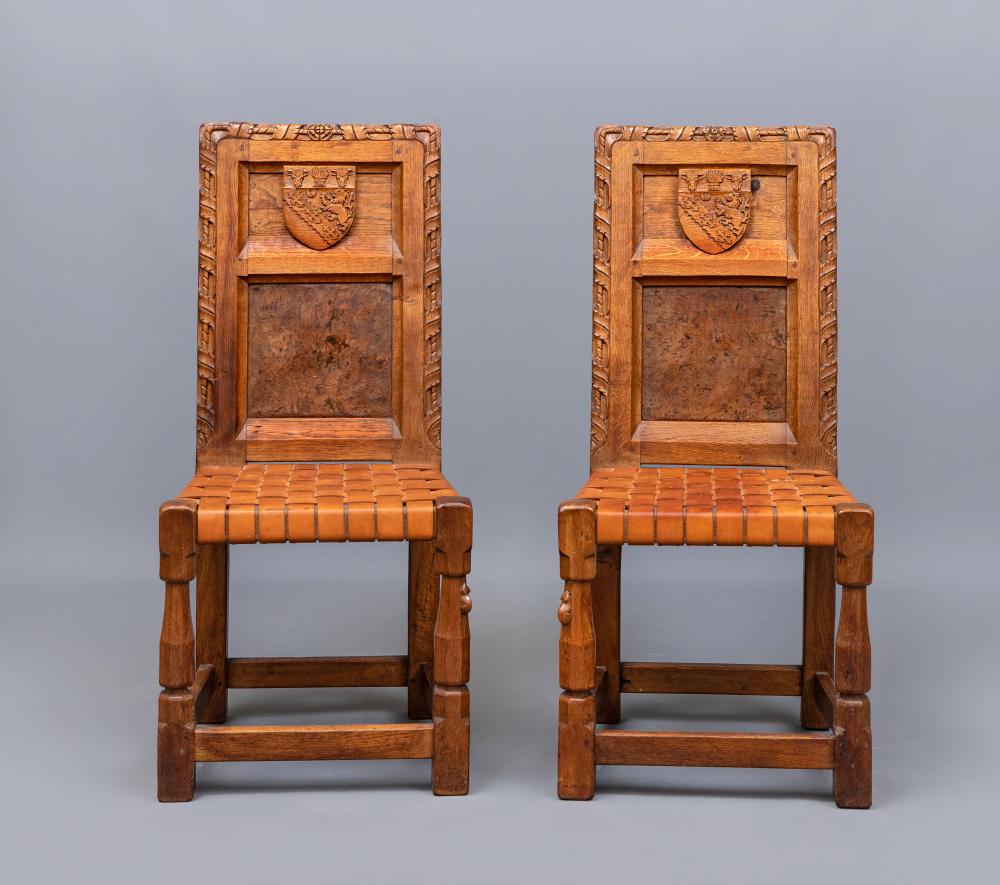 A PAIR OF ROBERT THOMPSON CARVED OAK HALL CHAIRS Image