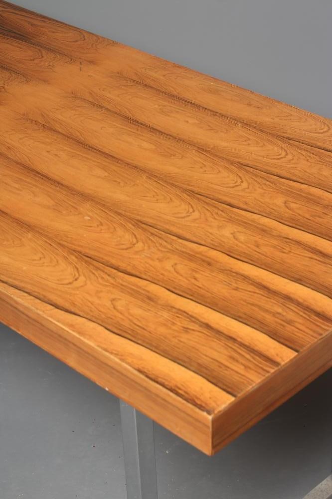 A ROSEWOOD VENEERED AND POLISHED STEEL(?) SIDE TABLE Image