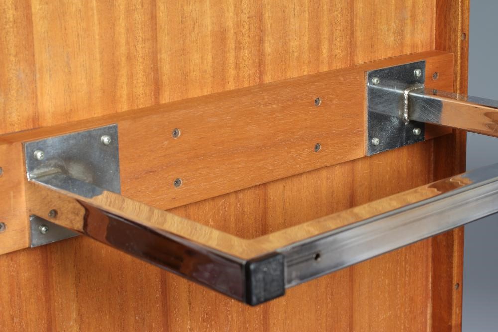 A ROSEWOOD VENEERED AND POLISHED STEEL(?) COFFEE TABLE Image