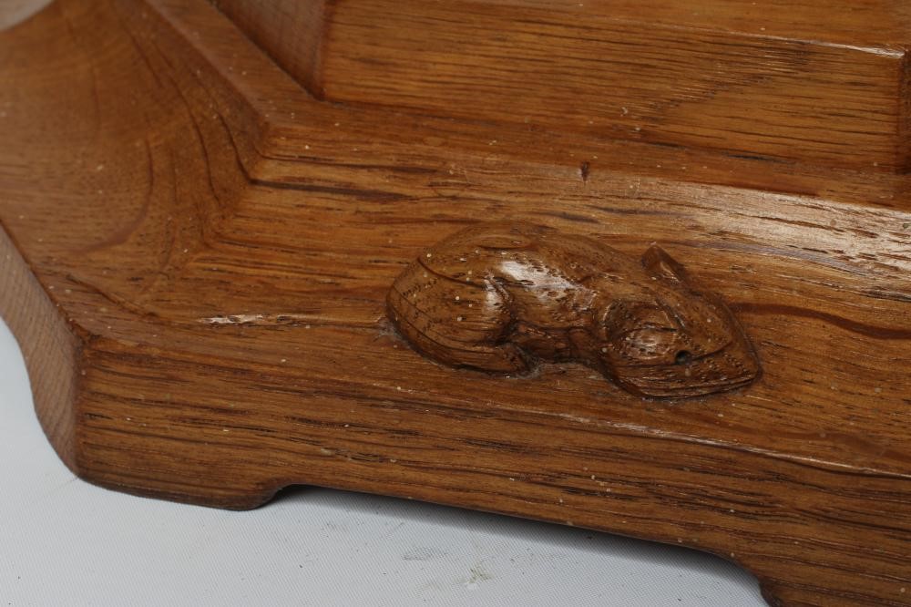 A ROBERT THOMPSON OAK PLANT STAND of octagonal form with collared tapering stem Image