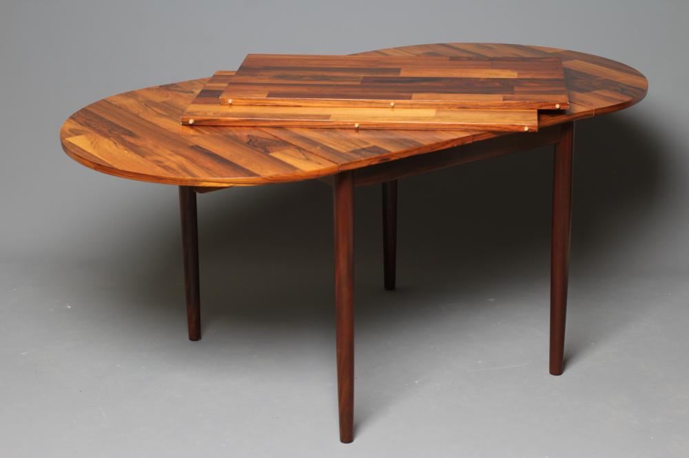 A DANISH DESIGN ROSEWOOD EXTENDING DINING TABLE Image
