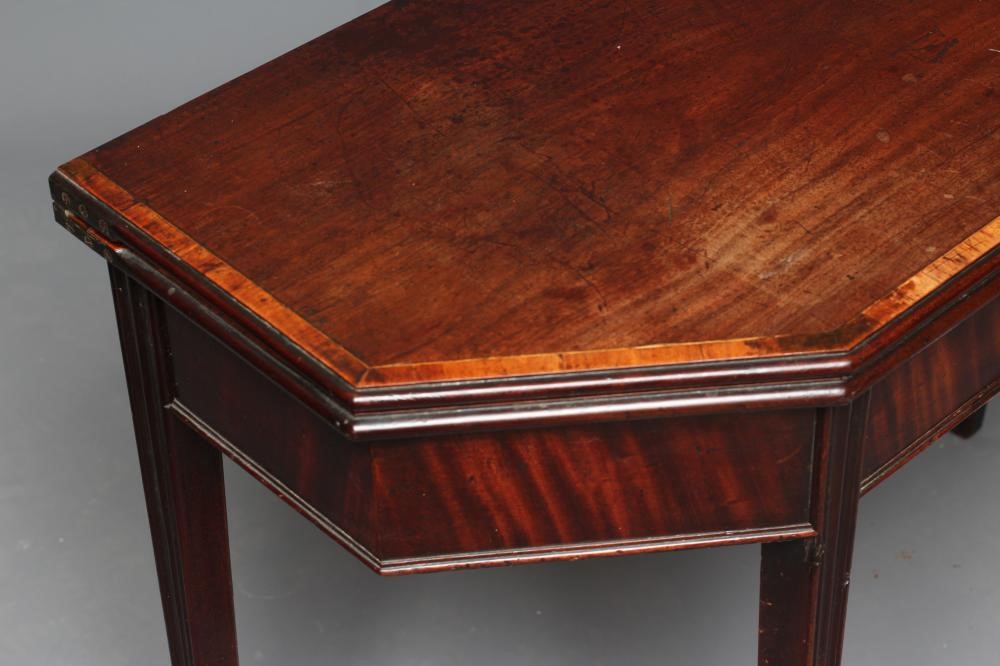 A GEORGIAN MAHOGANY FOLDING TEA TABLE Image